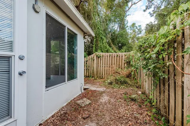 a view of a wooden fence