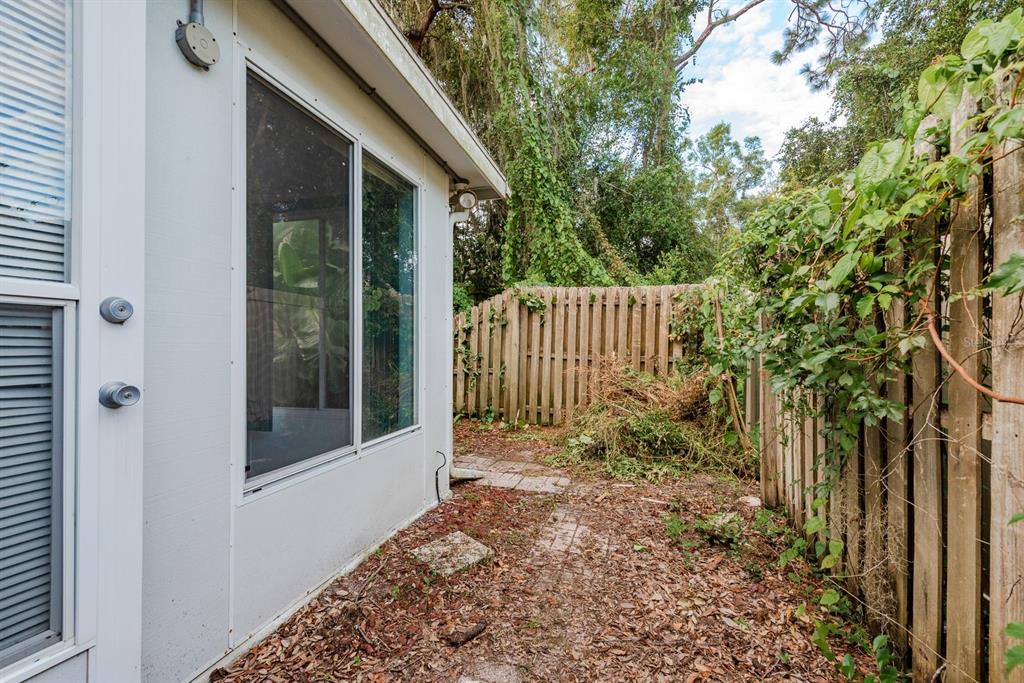 10918 Freemont Drive New Port Richey, FL 34654 - Photo 23 of 26 a view of small garden