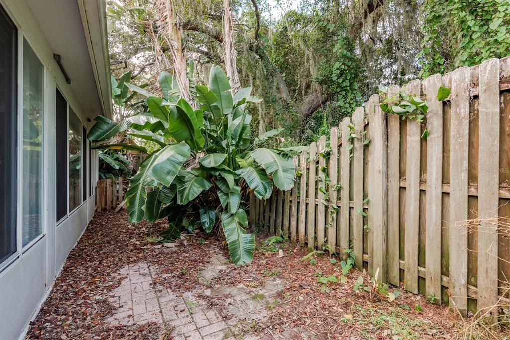 10918 Freemont Drive New Port Richey, FL 34654 - Photo 24 of 26 a view of a wooden fence