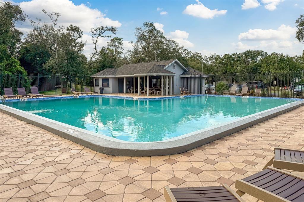 10918 Freemont Drive New Port Richey, FL 34654 - Photo 26 of 26 a view of a house with a yard