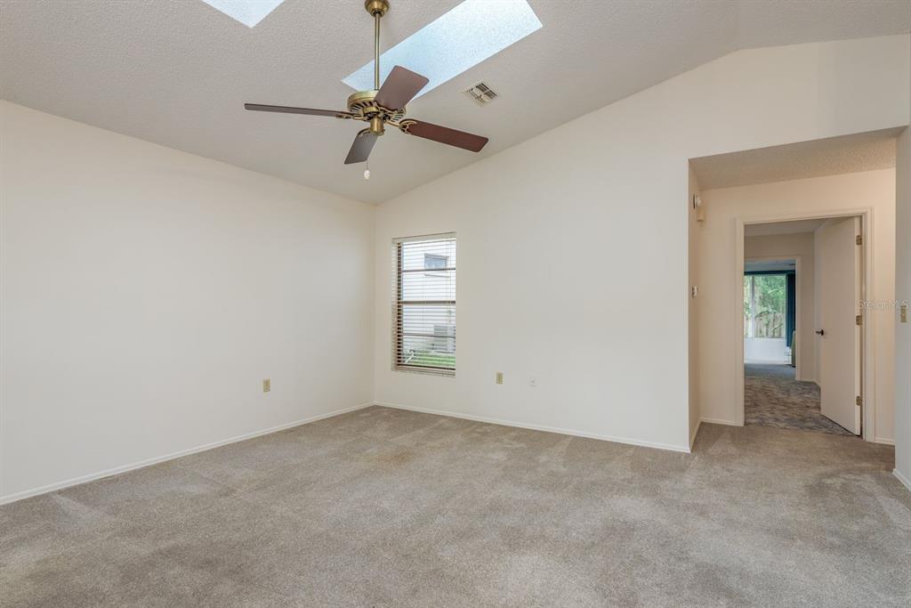 10918 Freemont Drive New Port Richey, FL 34654 - Photo 5 of 26 a view of an empty room with a window