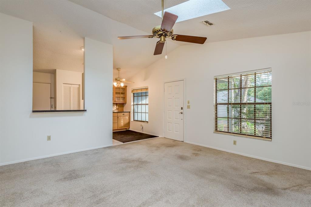 10918 Freemont Drive New Port Richey, FL 34654 - Photo 7 of 26 a view of an empty room with a window