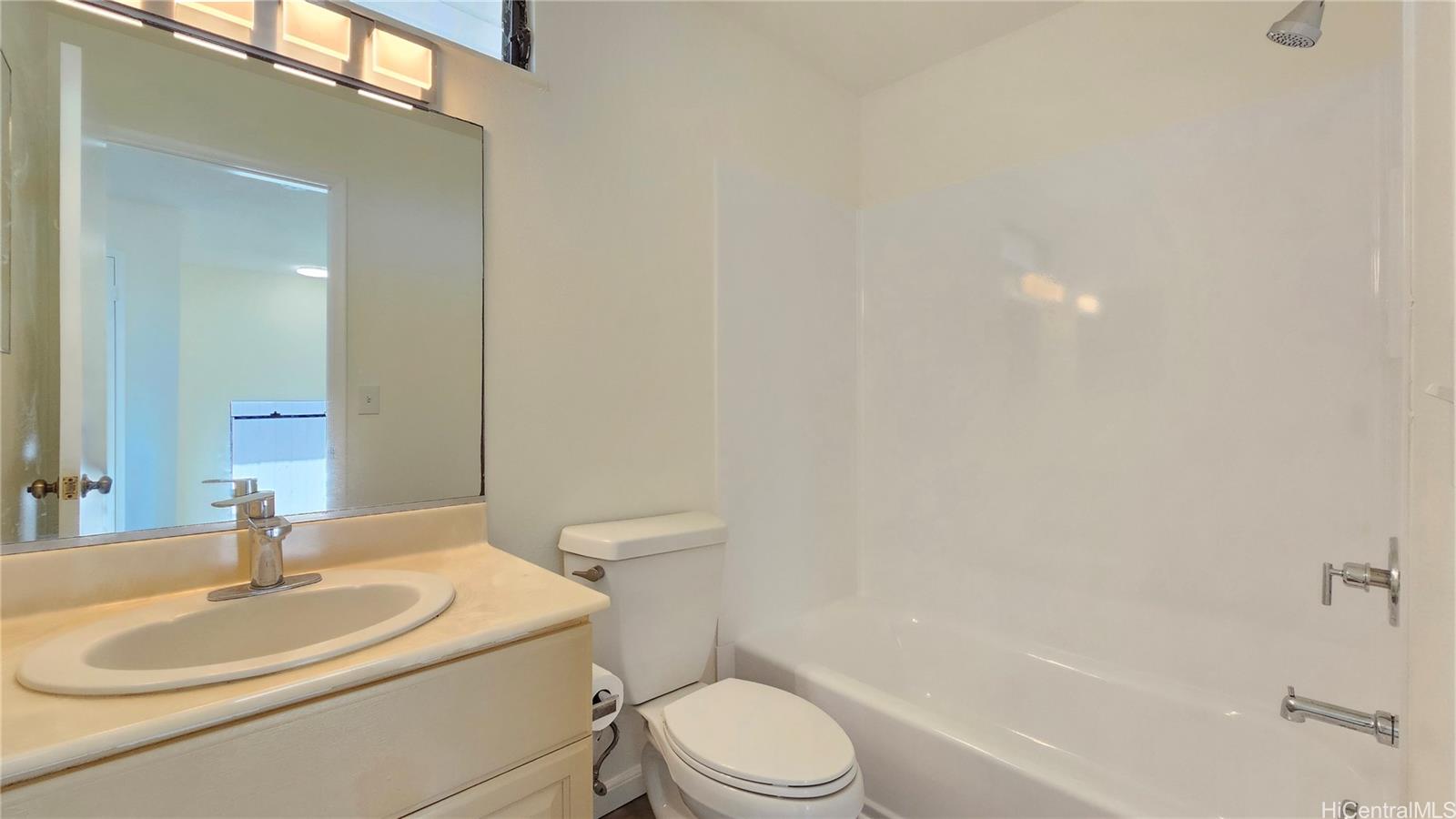 91-184 Kikiao Street Kapolei, HI 96707 - Photo 19 of 24 2nd Bathroom - Newly glazed tub. New Tub Fixtures