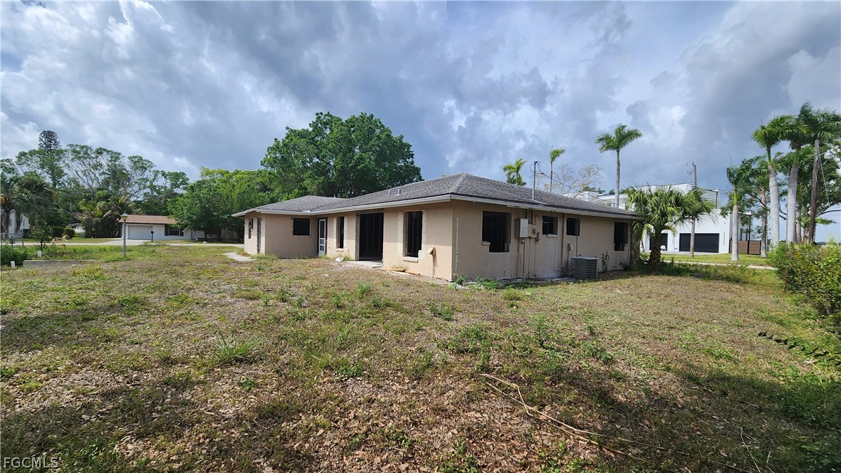 4528 East Riverside Drive Fort Myers, FL 33905 - Photo 13 of 13 a view of a house with a yard