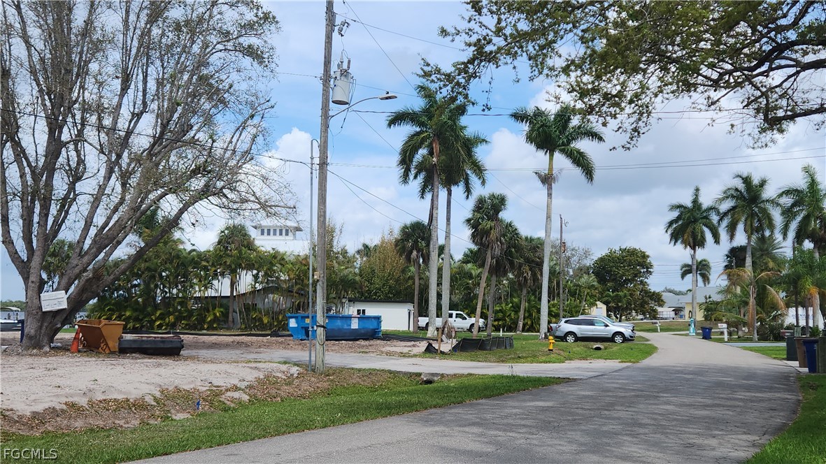 4528 East Riverside Drive Fort Myers, FL 33905 - Photo 5 of 13 a view of a park with swings and slides