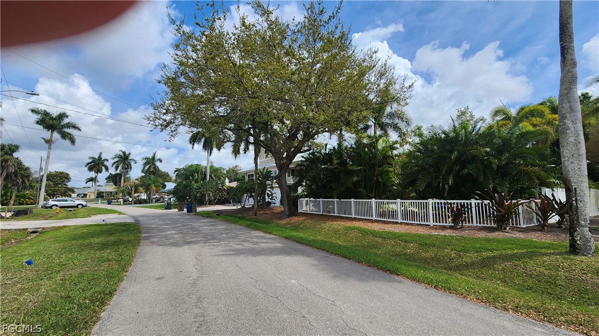 4528 East Riverside Drive Fort Myers, FL 33905 - Photo 6 of 13 a view of a park with swings and slides