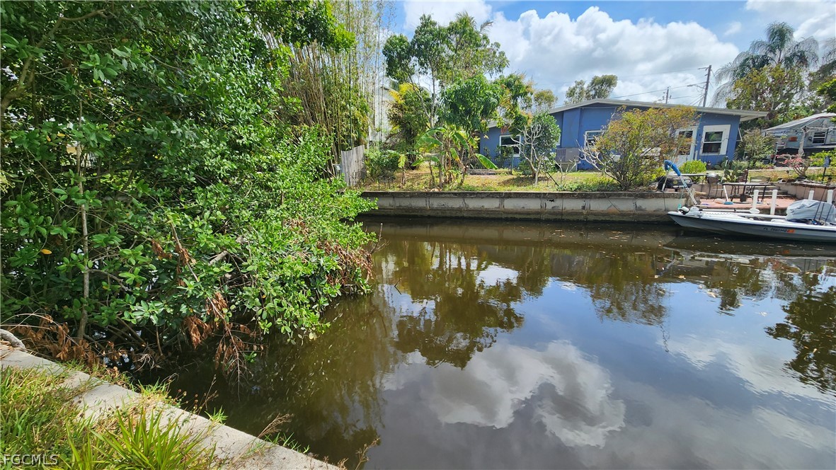 4528 East Riverside Drive Fort Myers, FL 33905 - Photo 10 of 13 a view of a lake with houses