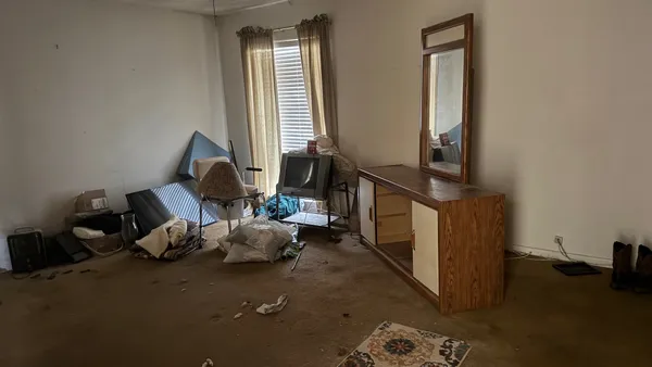 a room with furniture and a window