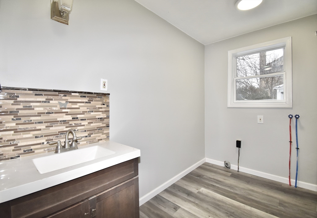36 Orleans Street Springfield, MA 01109 - Photo 14 of 32 a view of workspace with wooden floor