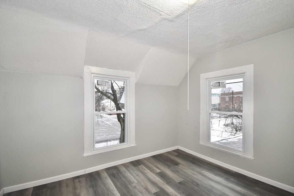 36 Orleans Street Springfield, MA 01109 - Photo 19 of 32 an empty room with windows