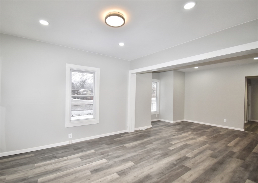 36 Orleans Street Springfield, MA 01109 - Photo 2 of 32 an empty room with windows
