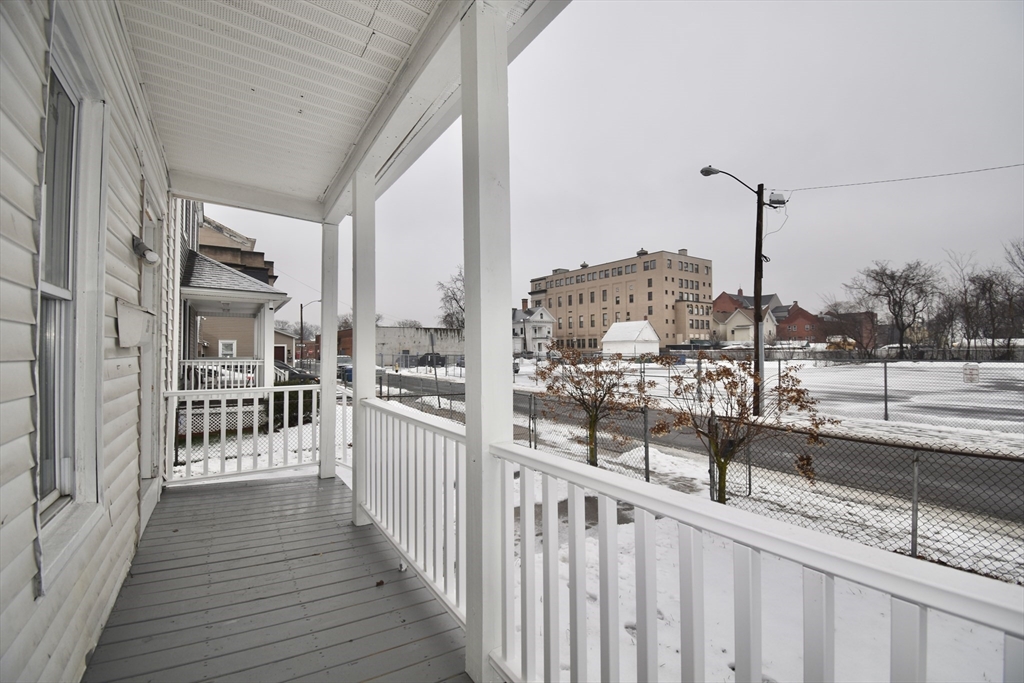 36 Orleans Street Springfield, MA 01109 - Photo 26 of 32 a view of a balcony with wooden floor