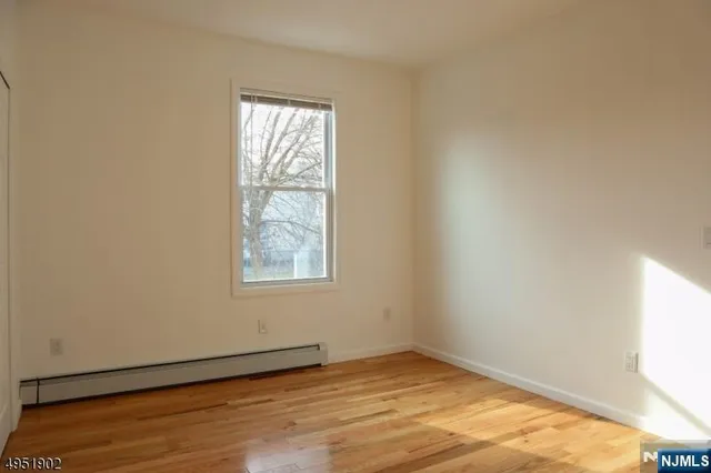 a bathroom with a toilet and a bathtub