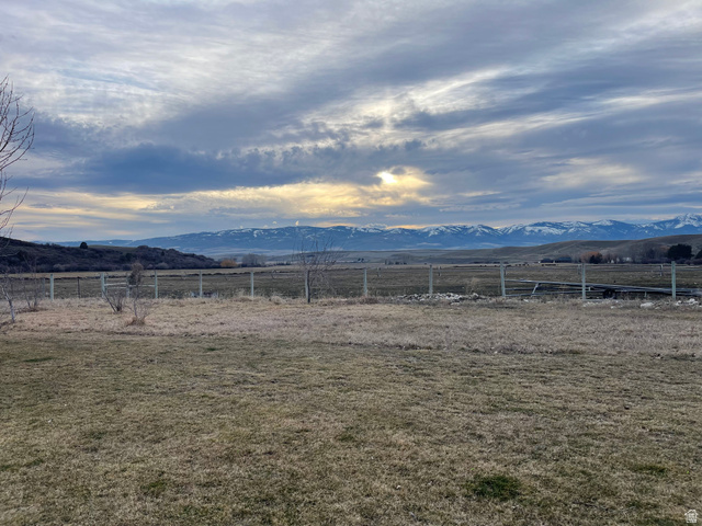 333 Lago Liberty Road Grace, ID 83241 - Photo 6 of 35 View of yard with a mountain view and a view of countryside