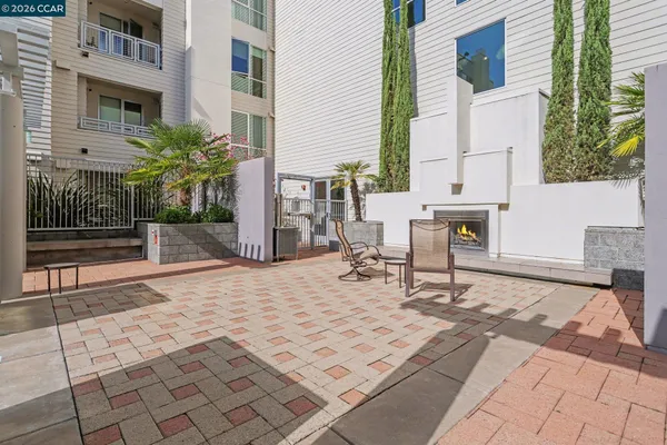 a view of a building with sitting area