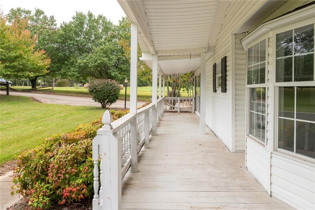 411 Apple Road Reidsville, NC 27320 - Photo 2 of 48 Full length rocking chair front porch