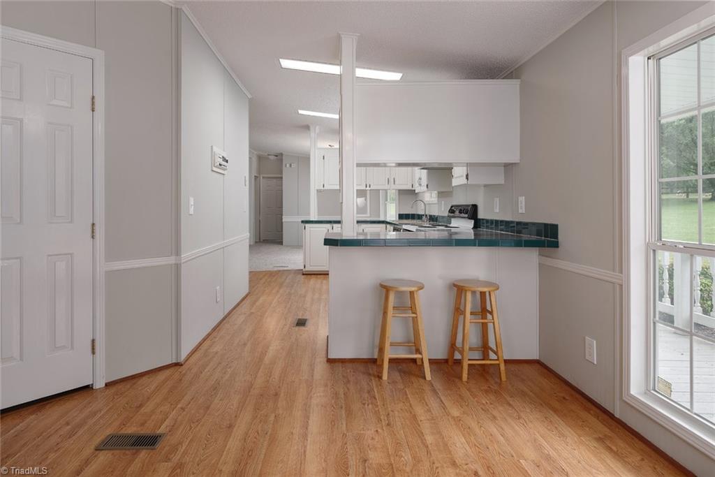 411 Apple Road Reidsville, NC 27320 - Photo 11 of 48 View from the Breakfast area featuring counter seating