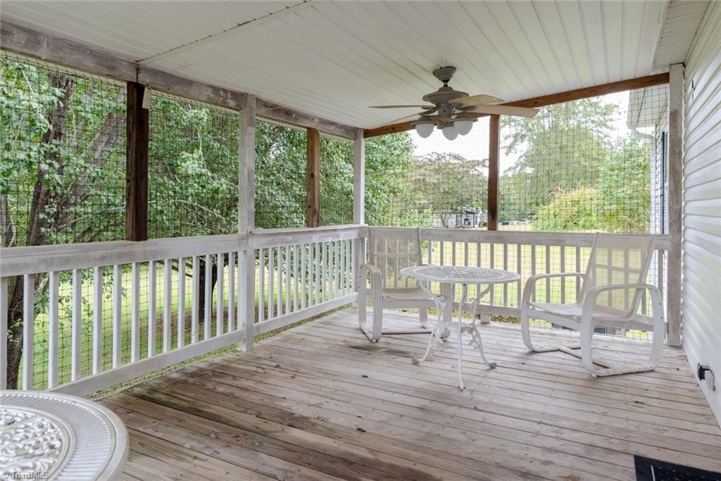 411 Apple Road Reidsville, NC 27320 - Photo 27 of 48 Covered back porch off the Living Room for enjoying that morning paper and cup of coffee