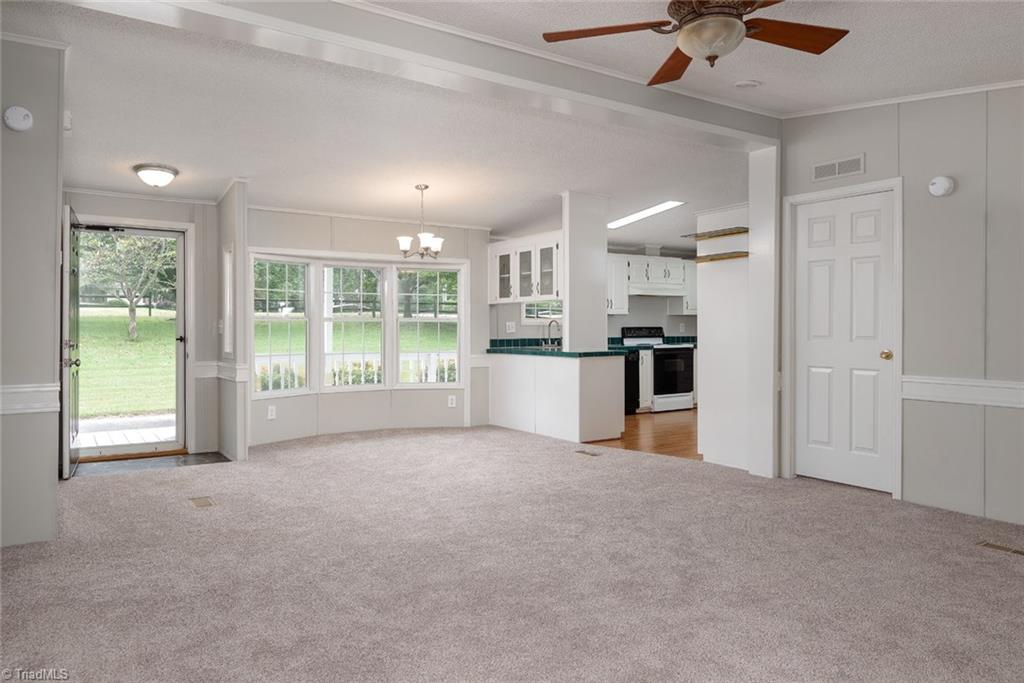 411 Apple Road Reidsville, NC 27320 - Photo 5 of 48 Living/Dining with view to the Kitchen