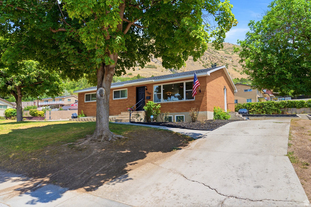 120 North 1230 E Street Springville, UT 84663 - Photo 60 of 60 Brick-front exterior with a black roof and white trim