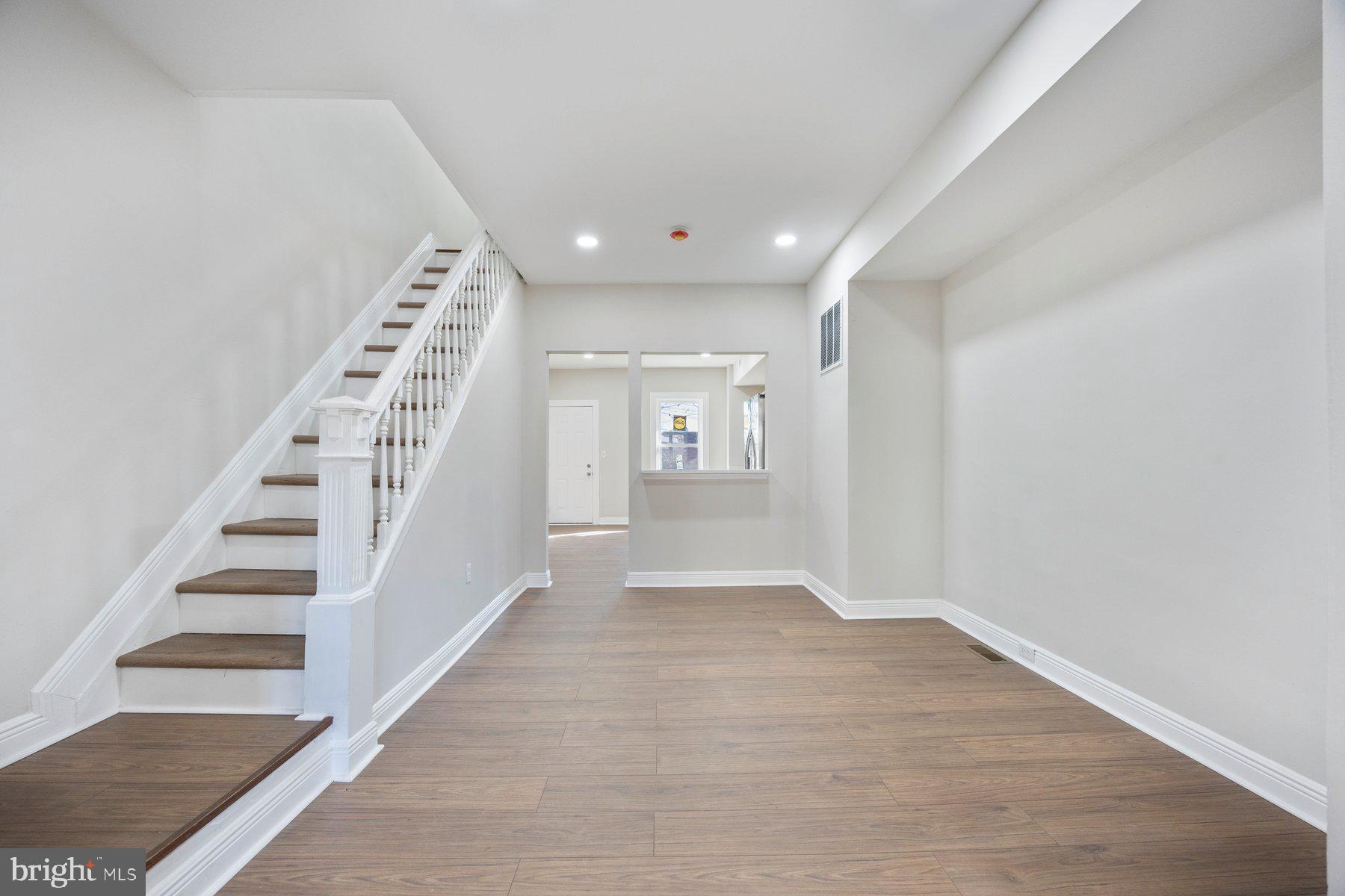 117 Collins Avenue Baltimore, MD 21229 - Photo 5 of 27 a view of entryway with wooden floor
