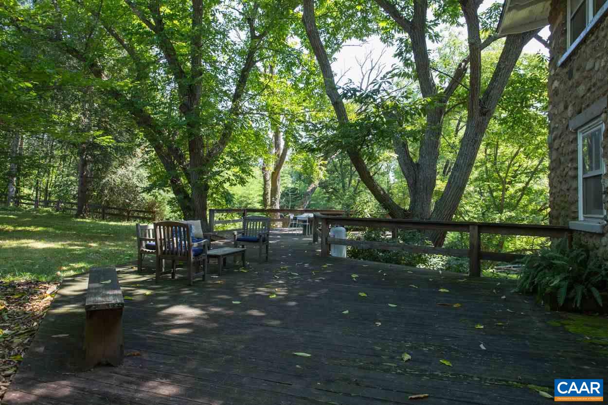 3211 Lowesville Road Roseland, VA 22967 - Photo 27 of 48 a view of a bench in a garden