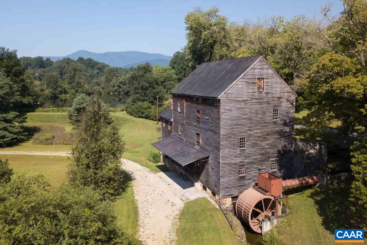 3211 Lowesville Road Roseland, VA 22967 - Photo 34 of 48 a aerial view of a house with a yard and lake view