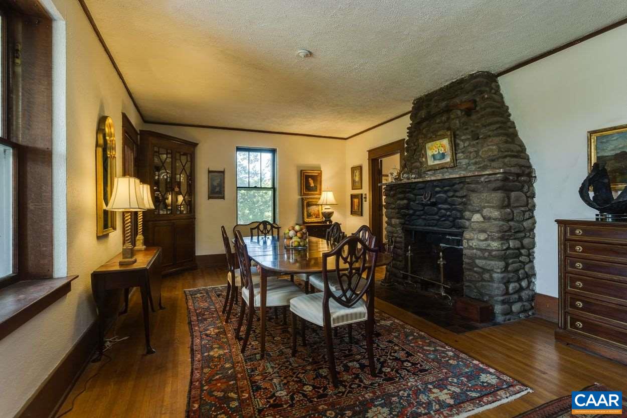 3211 Lowesville Road Roseland, VA 22967 - Photo 7 of 48 a dining room with furniture and wooden floor