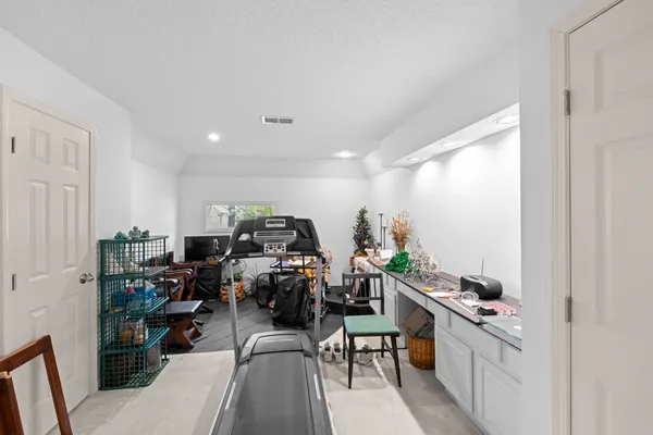 a view of a living room and dining room
