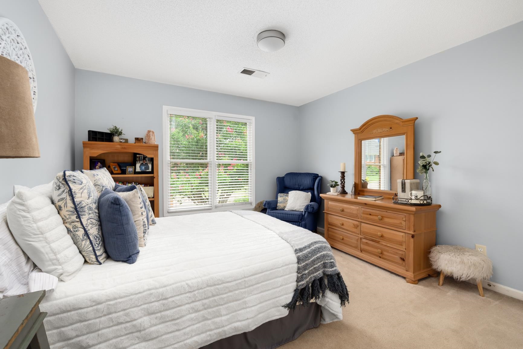 8993 Raspberry Lane Cordova, TN 38016 - Photo 34 of 40 a bedroom with a bed and a large window