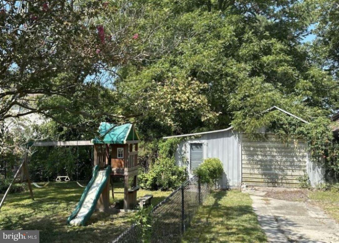 409 Myrtle Street Crisfield, MD 21817 - Photo 19 of 19 a view of house with backyard