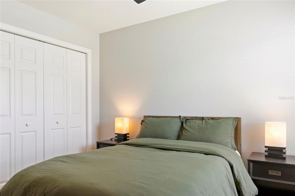 1204 Mezzavalle Way Auburndale, FL 33823 - Photo 16 of 42 a bedroom with a bed and a window