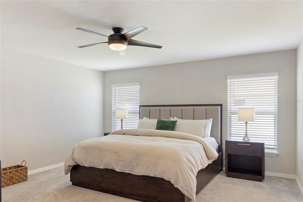 1204 Mezzavalle Way Auburndale, FL 33823 - Photo 20 of 42 a bedroom with a bed and window