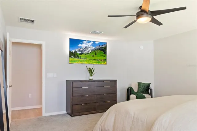 a bathroom with a tub a sink and mirror
