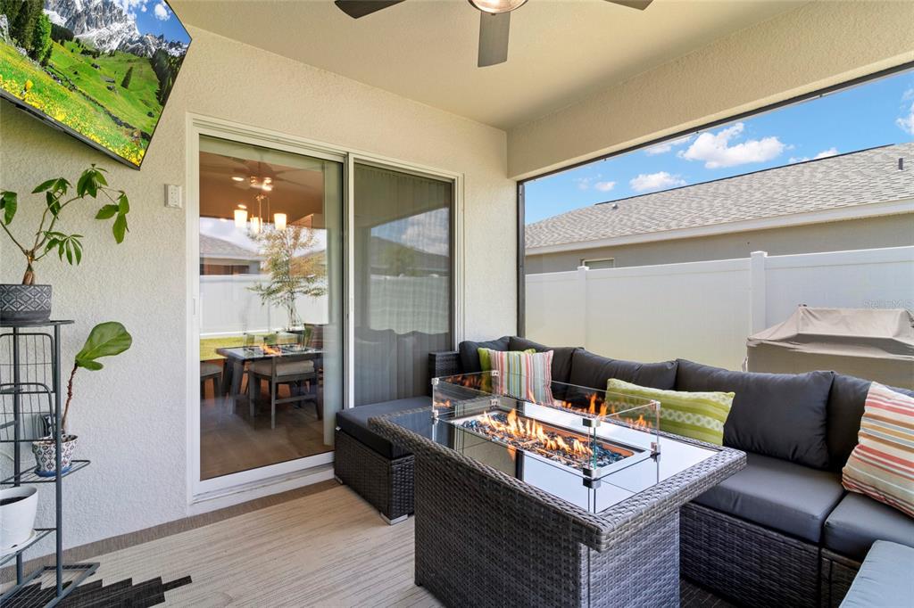 1204 Mezzavalle Way Auburndale, FL 33823 - Photo 27 of 42 a living room with furniture and wooden floor
