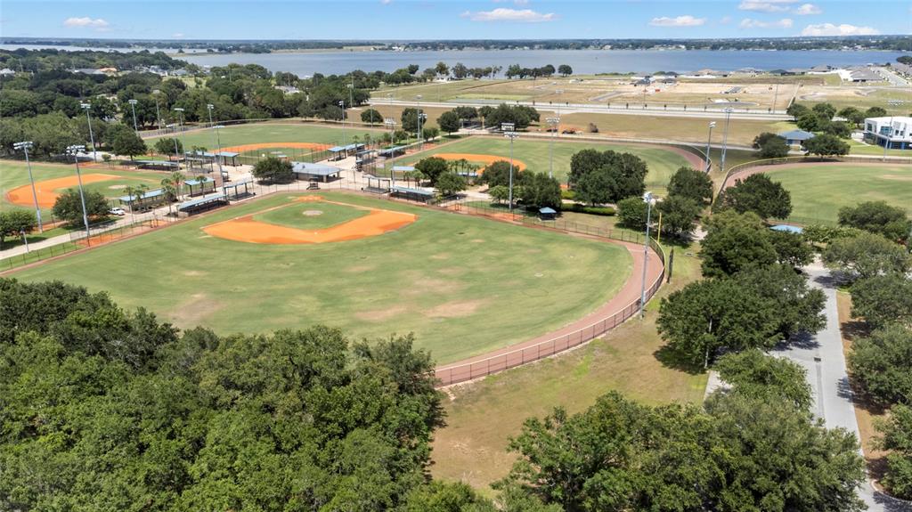 1204 Mezzavalle Way Auburndale, FL 33823 - Photo 30 of 42 a view of a swimming pool and lake view