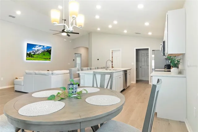 a view of a dining room with furniture