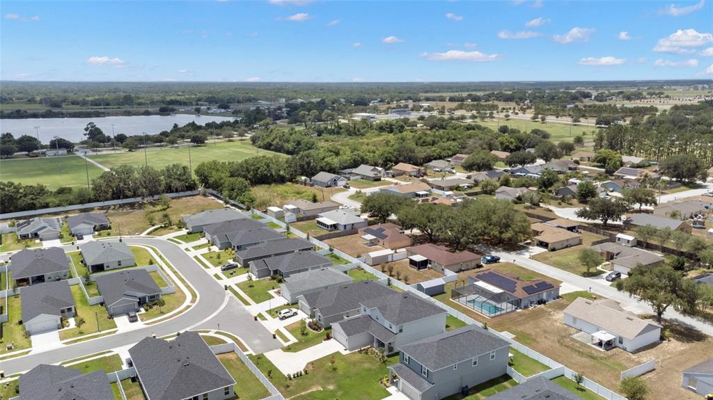 1204 Mezzavalle Way Auburndale, FL 33823 - Photo 36 of 42 an aerial view of a city with lots of residential buildings