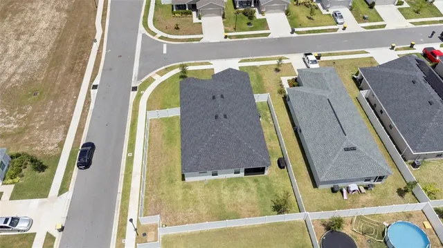 a view of a lake with a yard