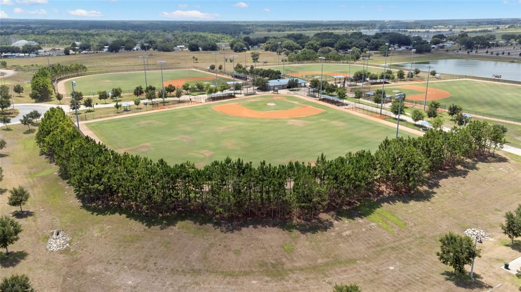 1204 Mezzavalle Way Auburndale, FL 33823 - Photo 40 of 42 a view of a lake with a mountain in the background