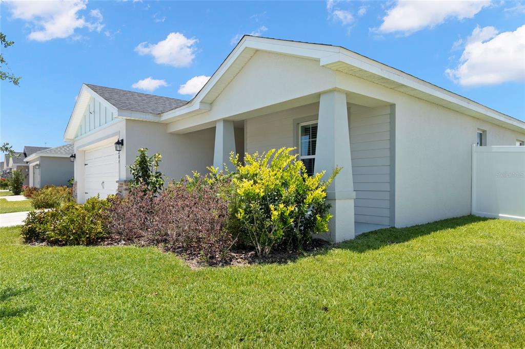1204 Mezzavalle Way Auburndale, FL 33823 - Photo 7 of 42 a front view of house with green space