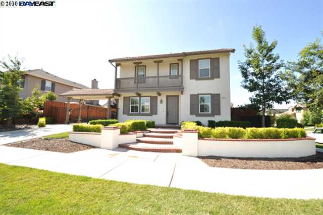 5833 New Hall Way Livermore, CA 94550 - Photo 1 of 1 a front view of a house with a yard