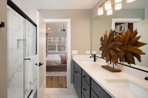 a bathroom with a sink and a mirror