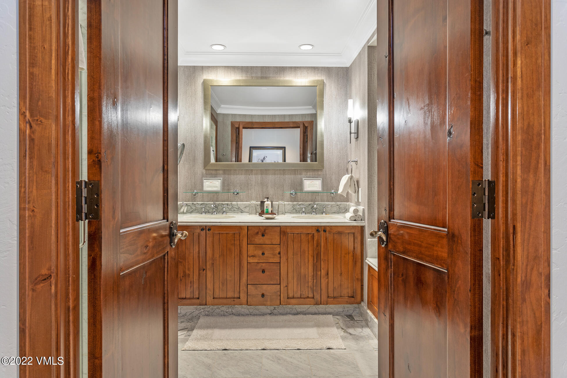 100 Bachelor Ridge Road, Unit 3707 Avon, CO 81620 - Photo 14 of 41 a bathroom with a sink and a mirror