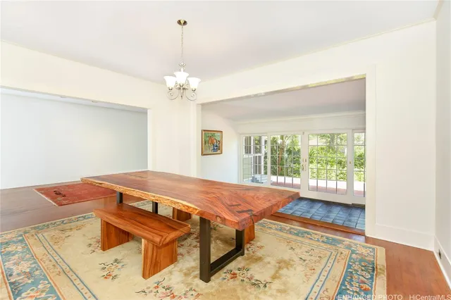 a spacious bedroom with a bed and a window