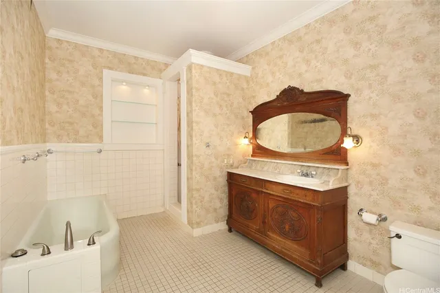 a bathroom with a sink a toilet and a bathtub