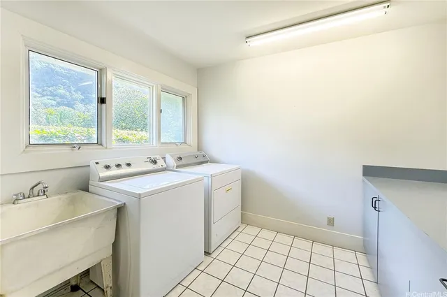 a view of bathroom with dual sinks