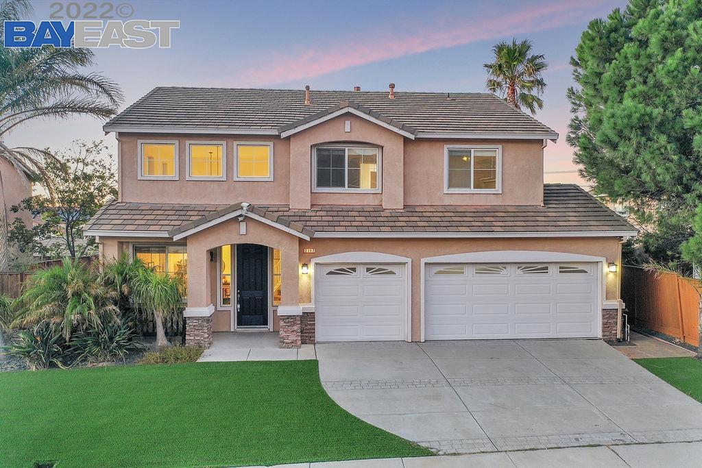 2397 Fieldgate Drive Pittsburg, CA 94565 - Photo 1 of 1 a front view of a house with a yard and garage