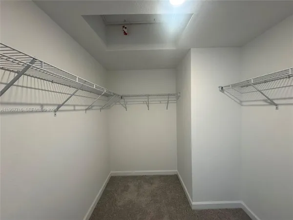 a view of a room with racks on the wall