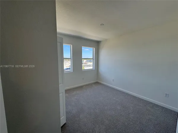 a view of an empty room with window